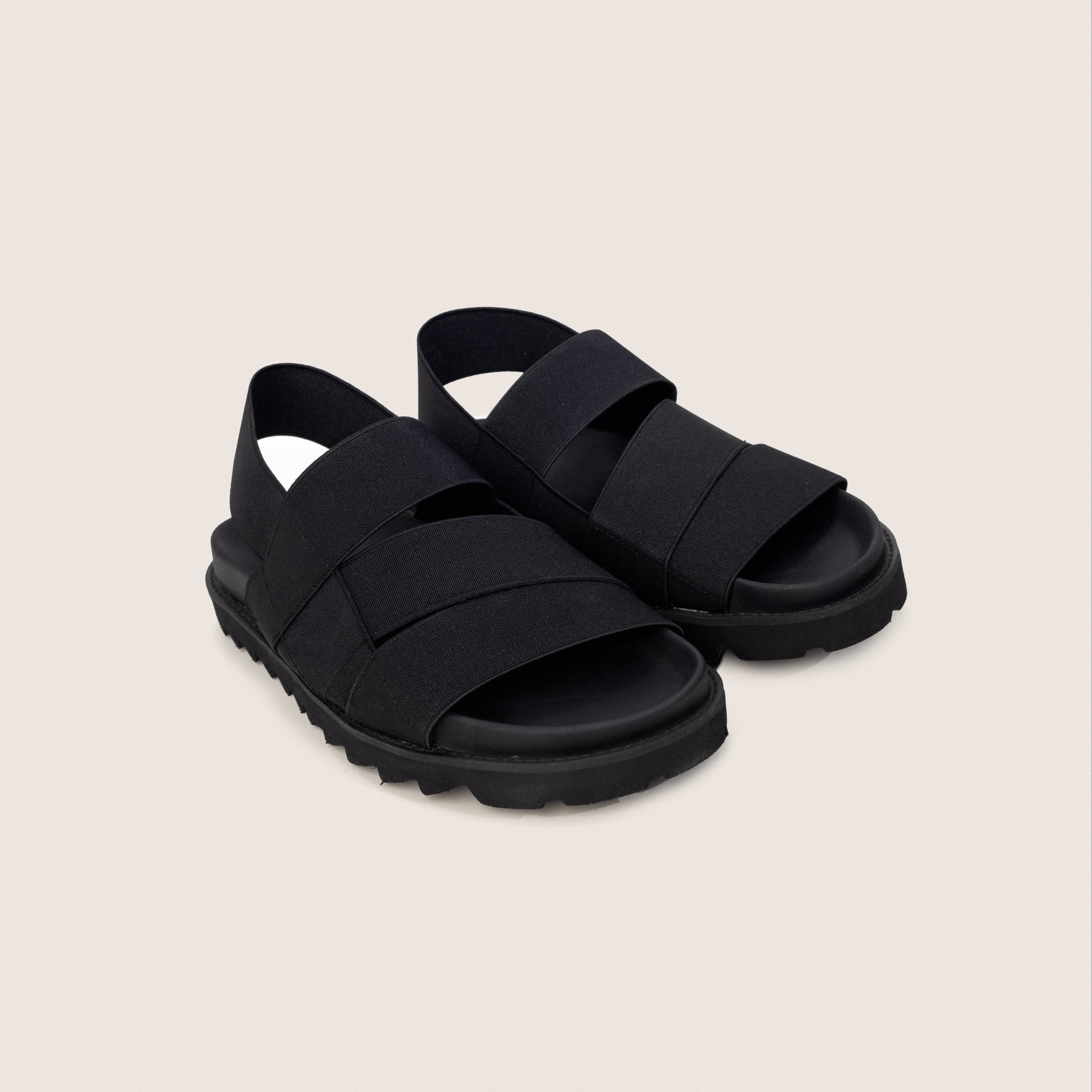The Elastic Sandals in Black